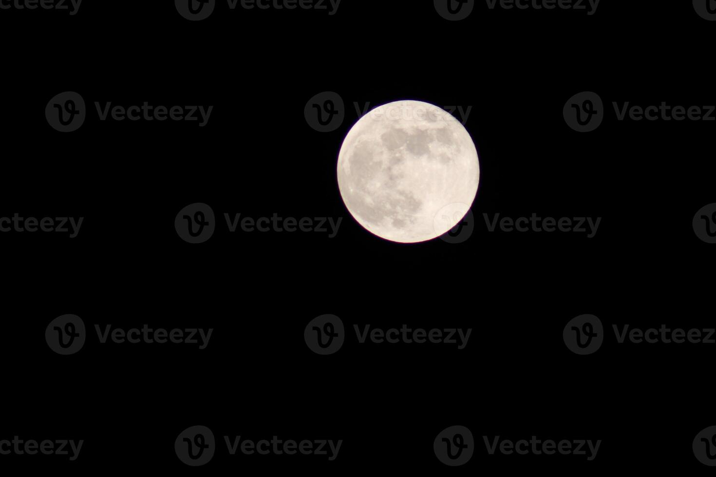 Full Moon Shining Bright In The Sky During The Night. photo