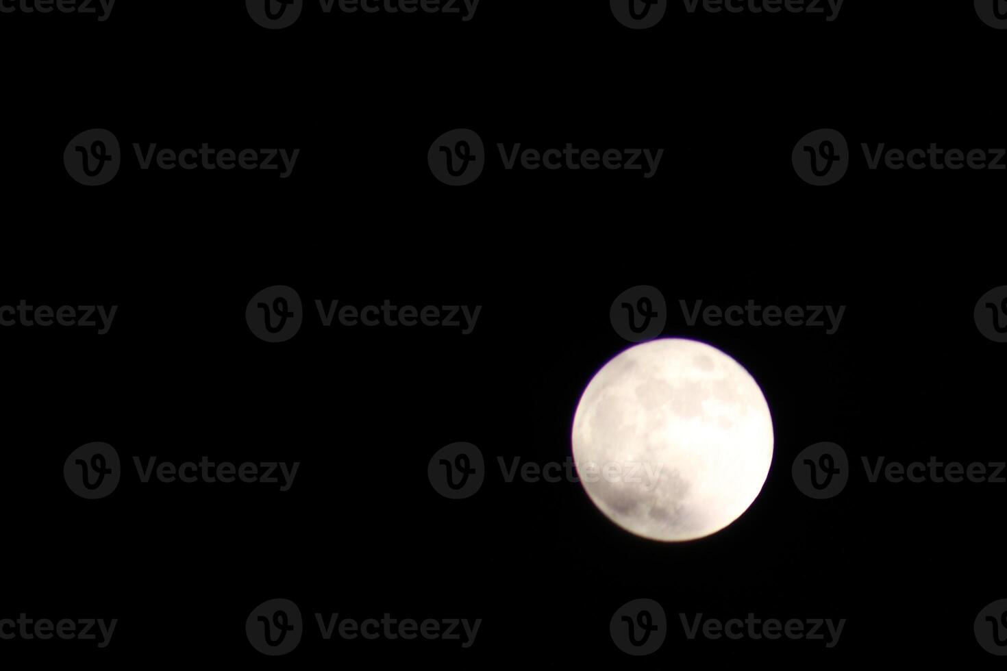 Full Moon Shining Bright In The Sky During The Night. photo