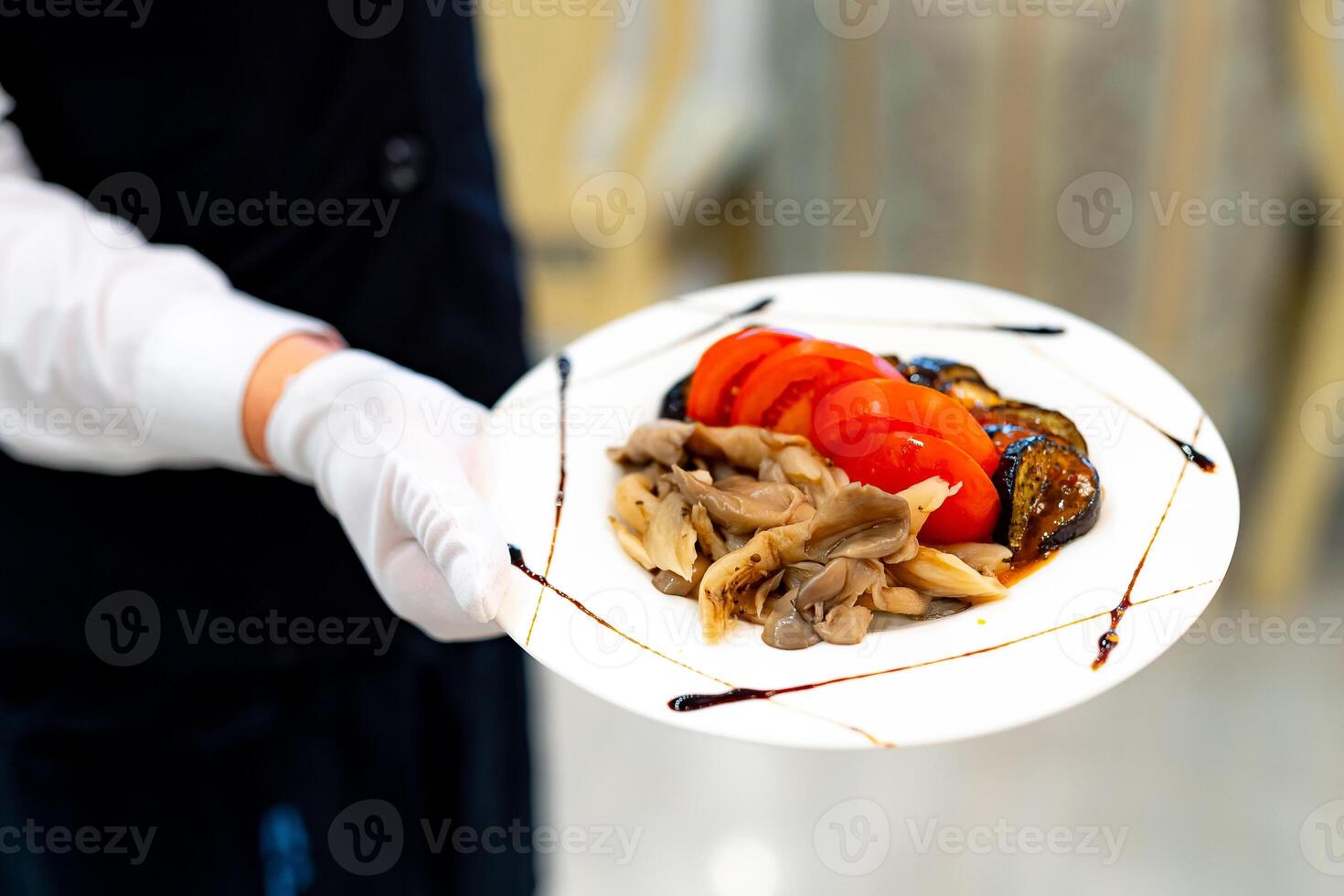 Elegant Person Holding a Delicious Plate of Food photo