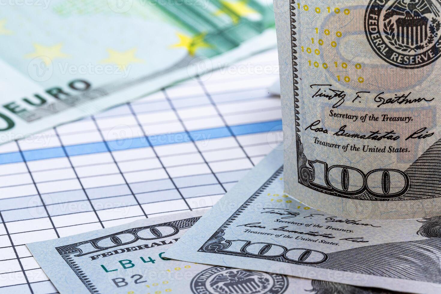 A Stack of Cash on a Table. A pile of money sitting on top of a table photo