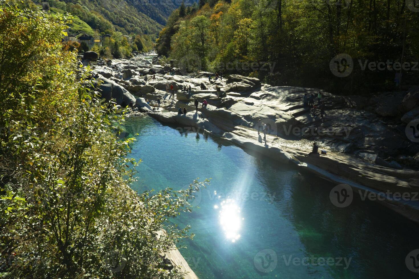 a river with a bridge photo