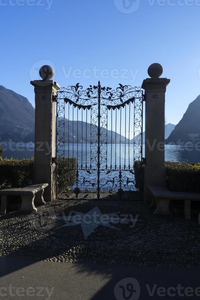 a gate with a star on it on lugano lake photo