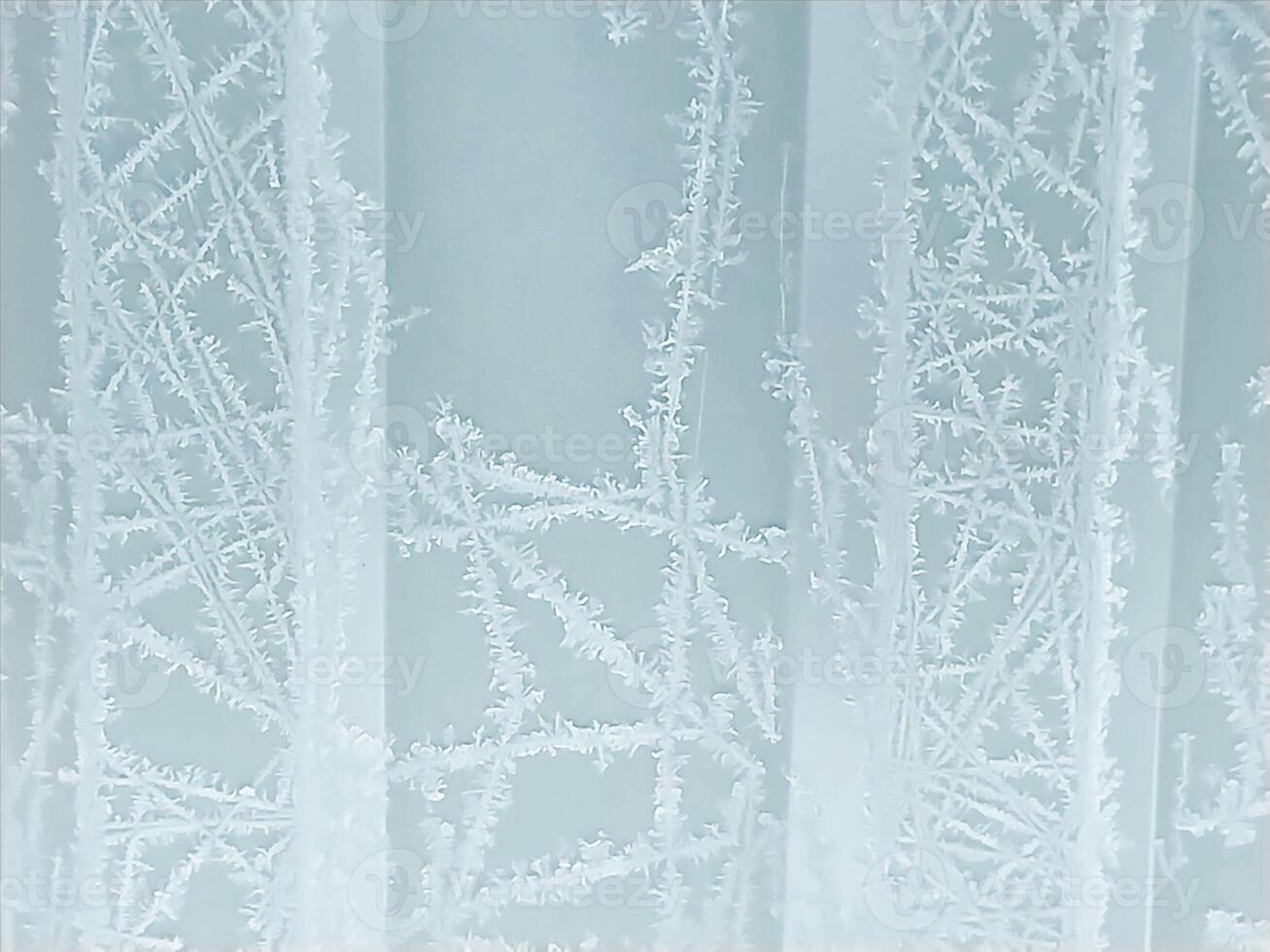 winter frosty background with snow patterns on ribbed texture photo