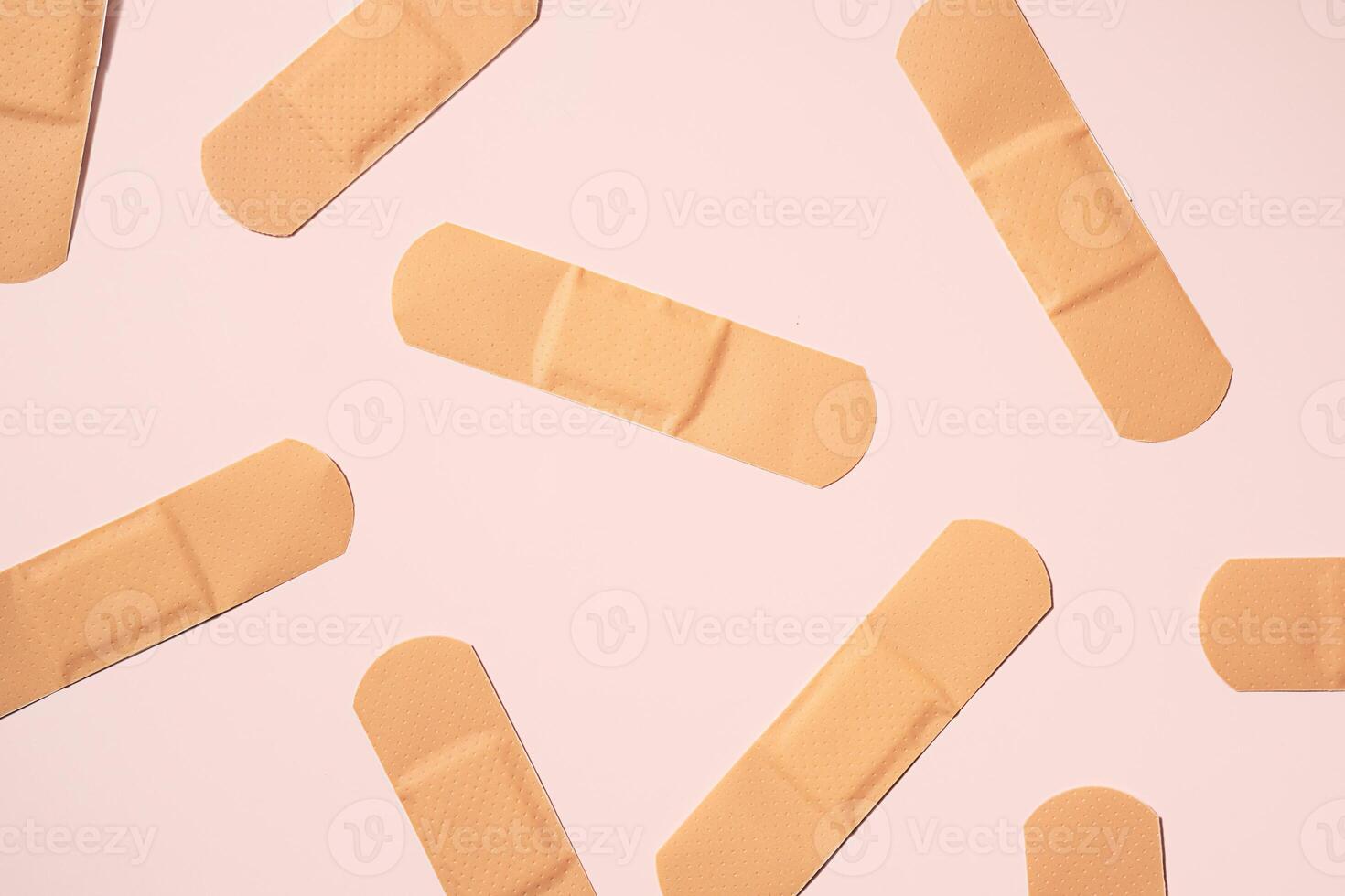 Adhesive bandage for firs aid. Band aids layout. photo
