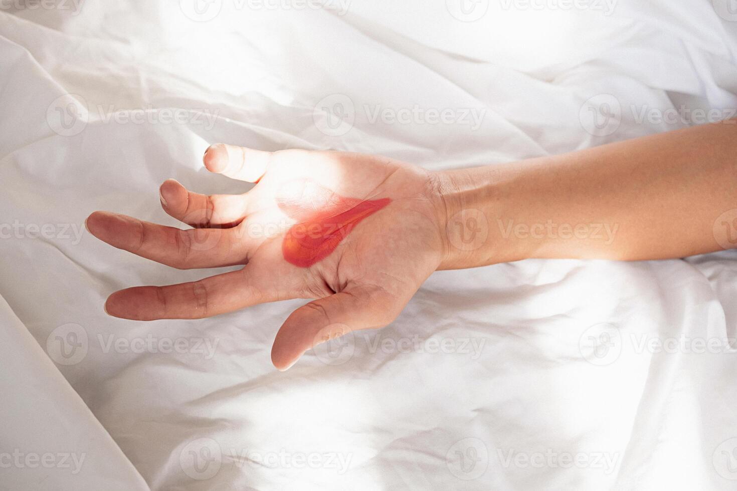 Heart shape drawing on the palm of hand. photo