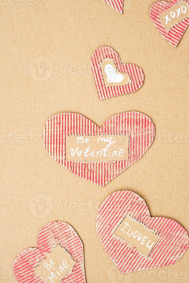 DIY cardboard Valentines. Ecological Valentine Day idea. photo