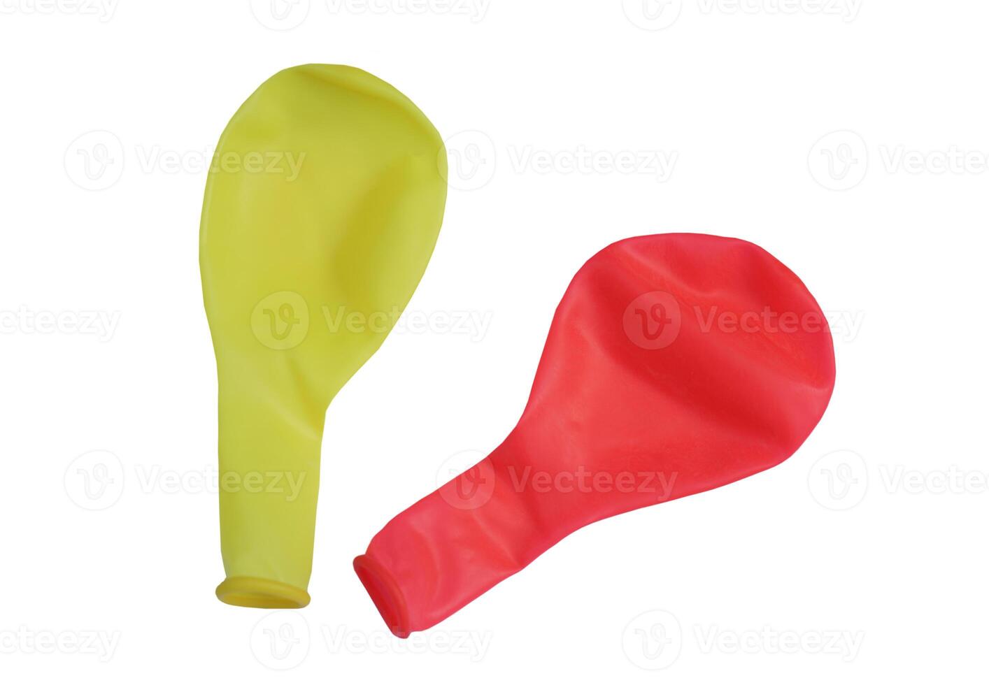 Red and rellow balloons on white background, flat, no air inside. Concept, equipment for decoration party, celebration,toy for playing games or doing science experiment. photo