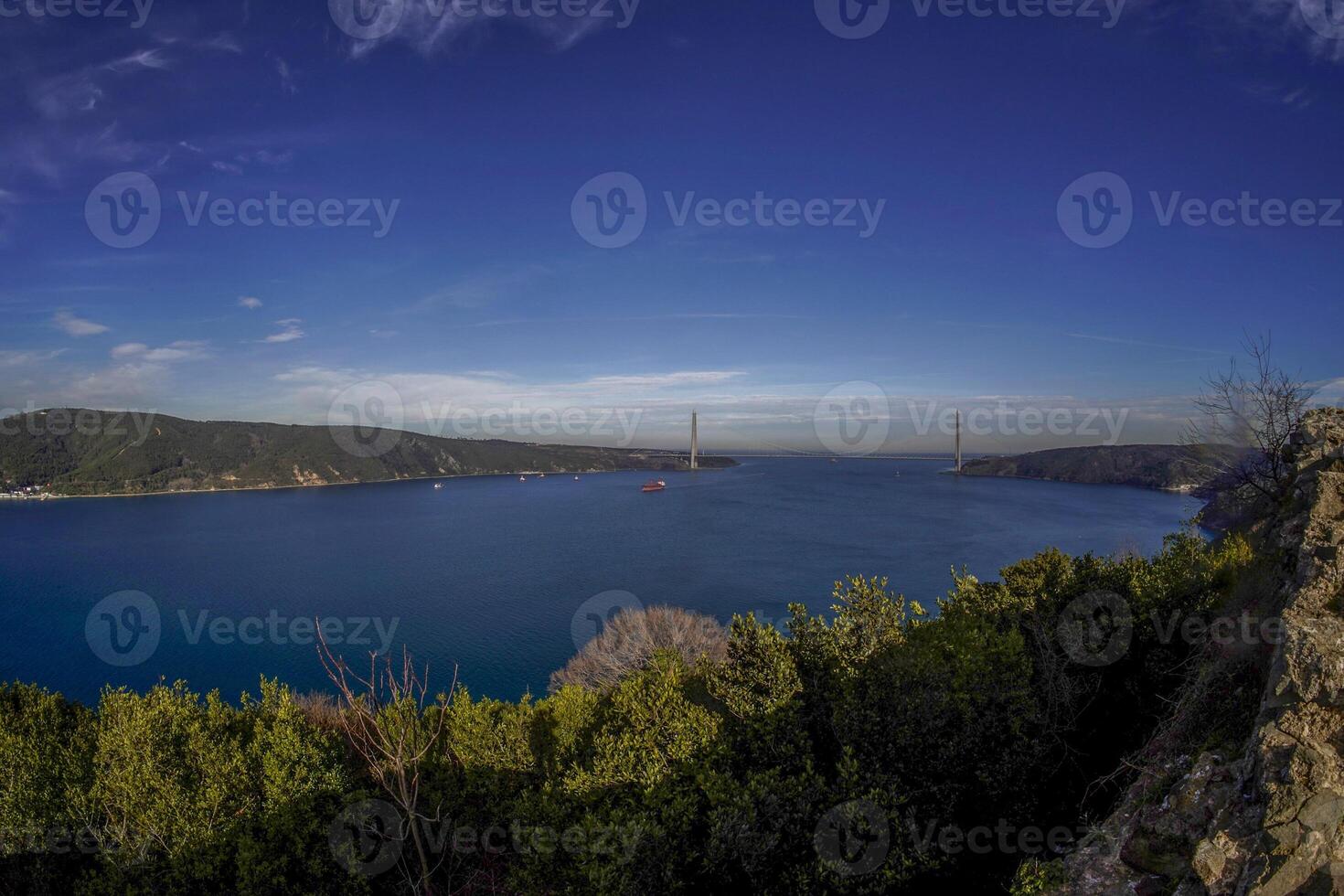 Aerial view from Fortress Ruins of Yoros Castle, Yoros Kalesi, or Genoese Castle, an ancient Byzantine castle at the confluence of Bosphorus and Black Sea in Anadolu Kavagi, Istanbul, Turkey photo