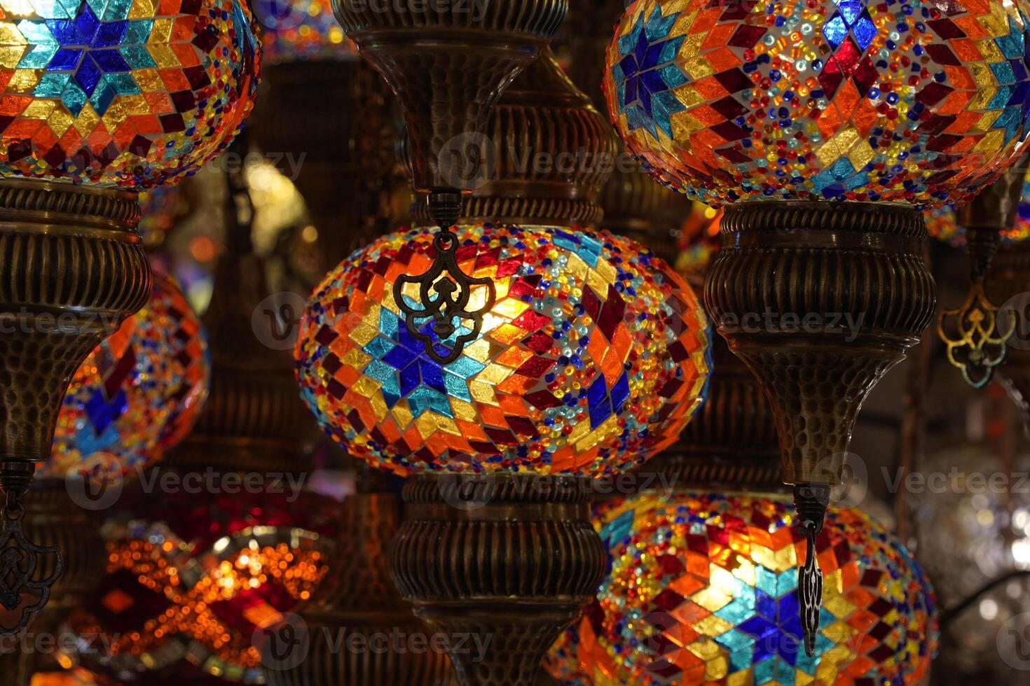 Colorful turkish glass lamps chandelier with glass details in Istanbul grand bazar Turkey photo