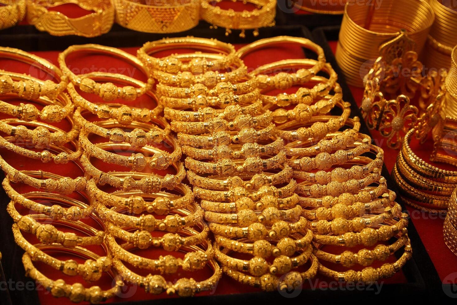 gold shop windows at istanbul grand bazar or Kapali Carsi, Turkey. Jewelry in the store window. A lot of luxury jewelry in the oriental market. Concept of shopping in Middle East. photo