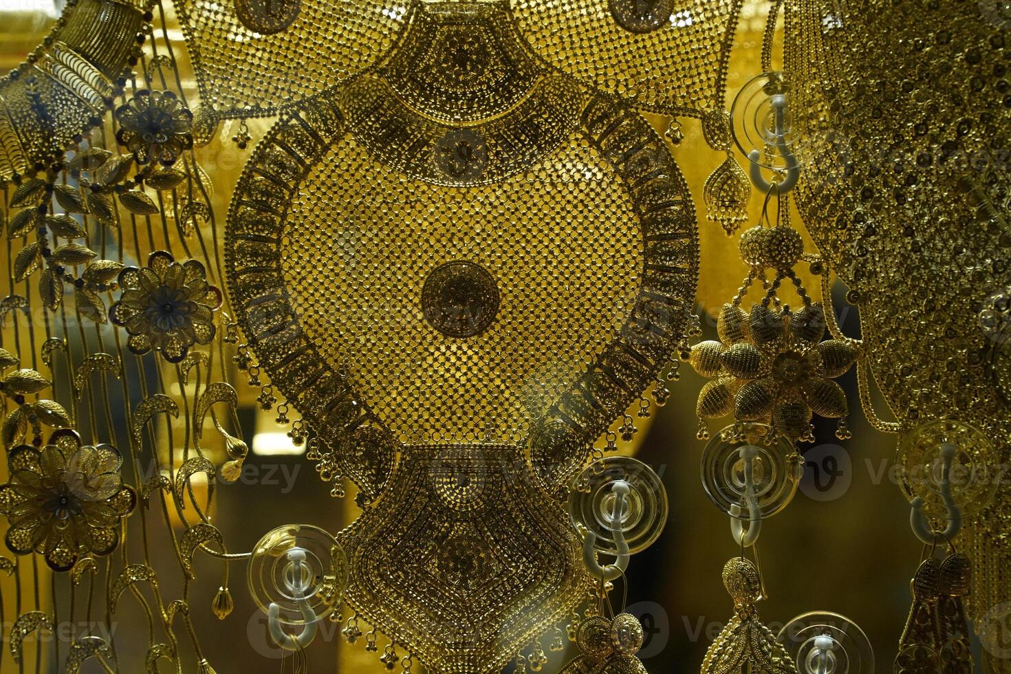 gold shop windows at istanbul grand bazar or Kapali Carsi, Turkey. Jewelry in the store window. A lot of luxury jewelry in the oriental market. Concept of shopping in Middle East. photo