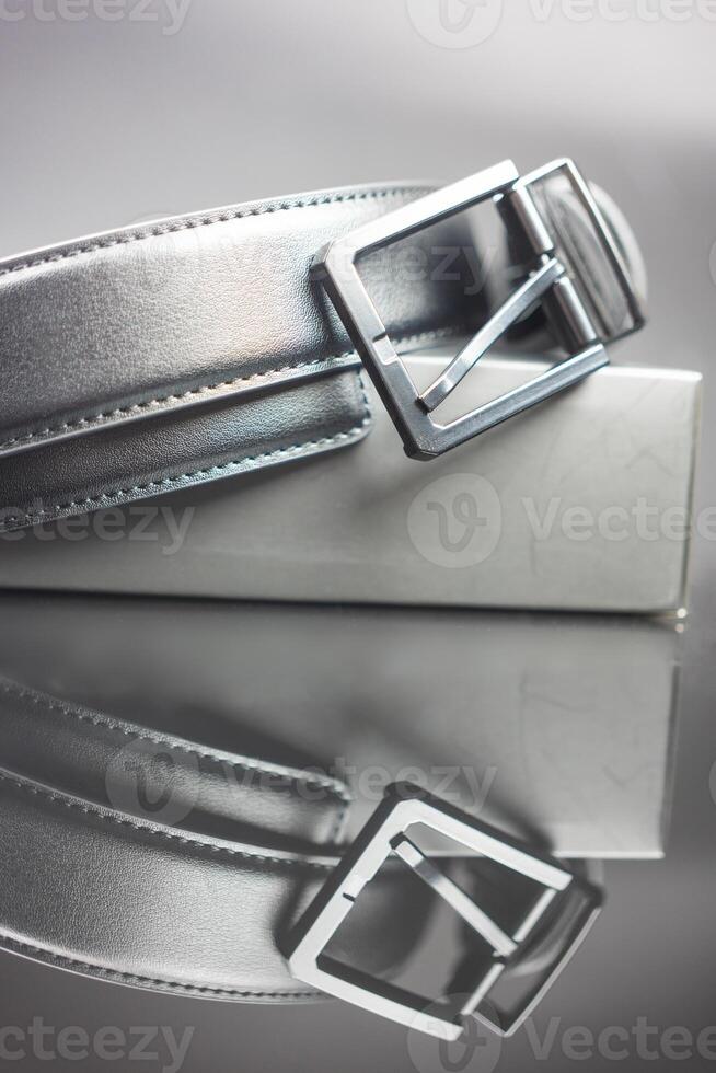 Leather black belt with metal buckle photo