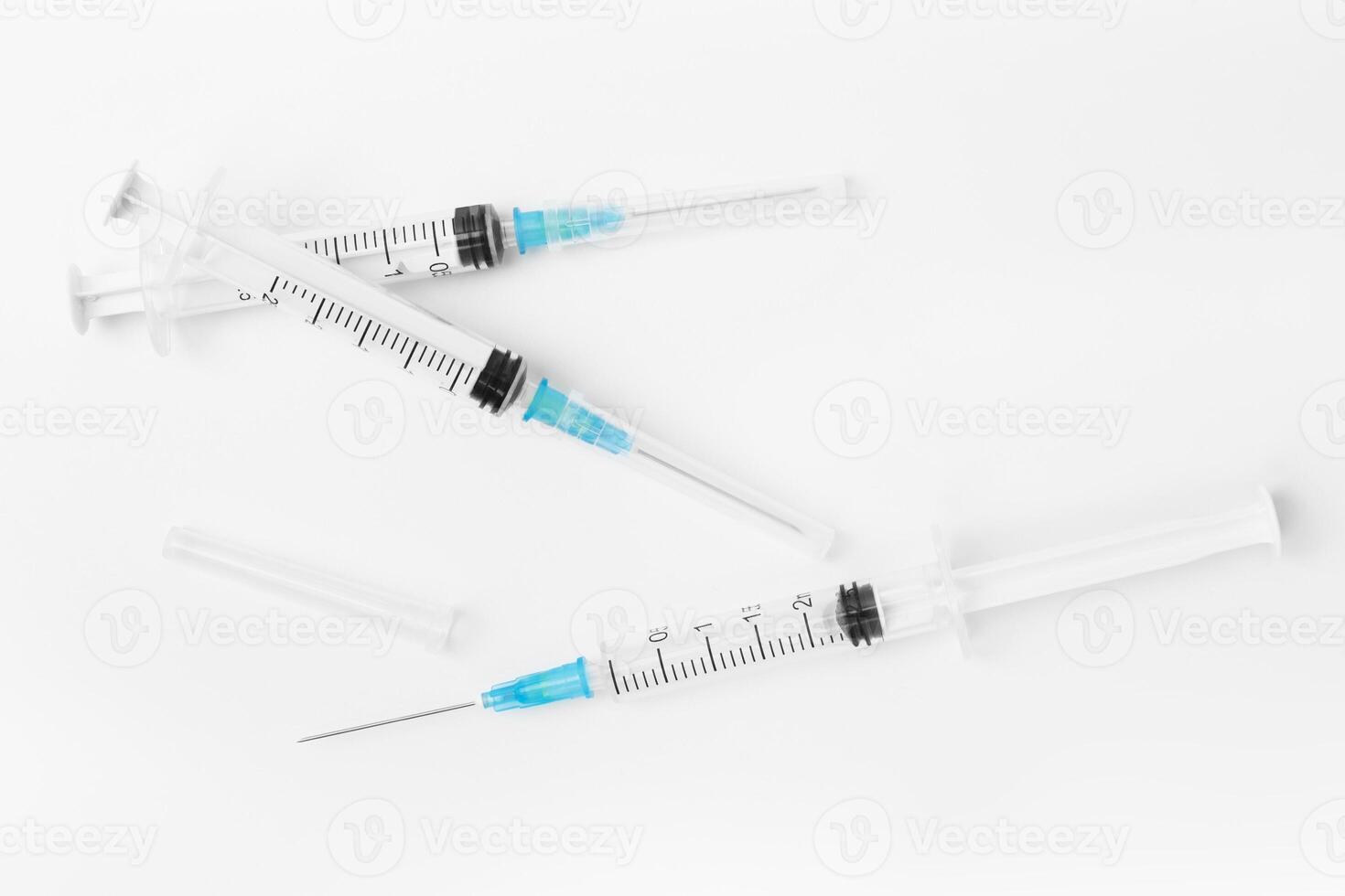 syringe isolated on white background photo