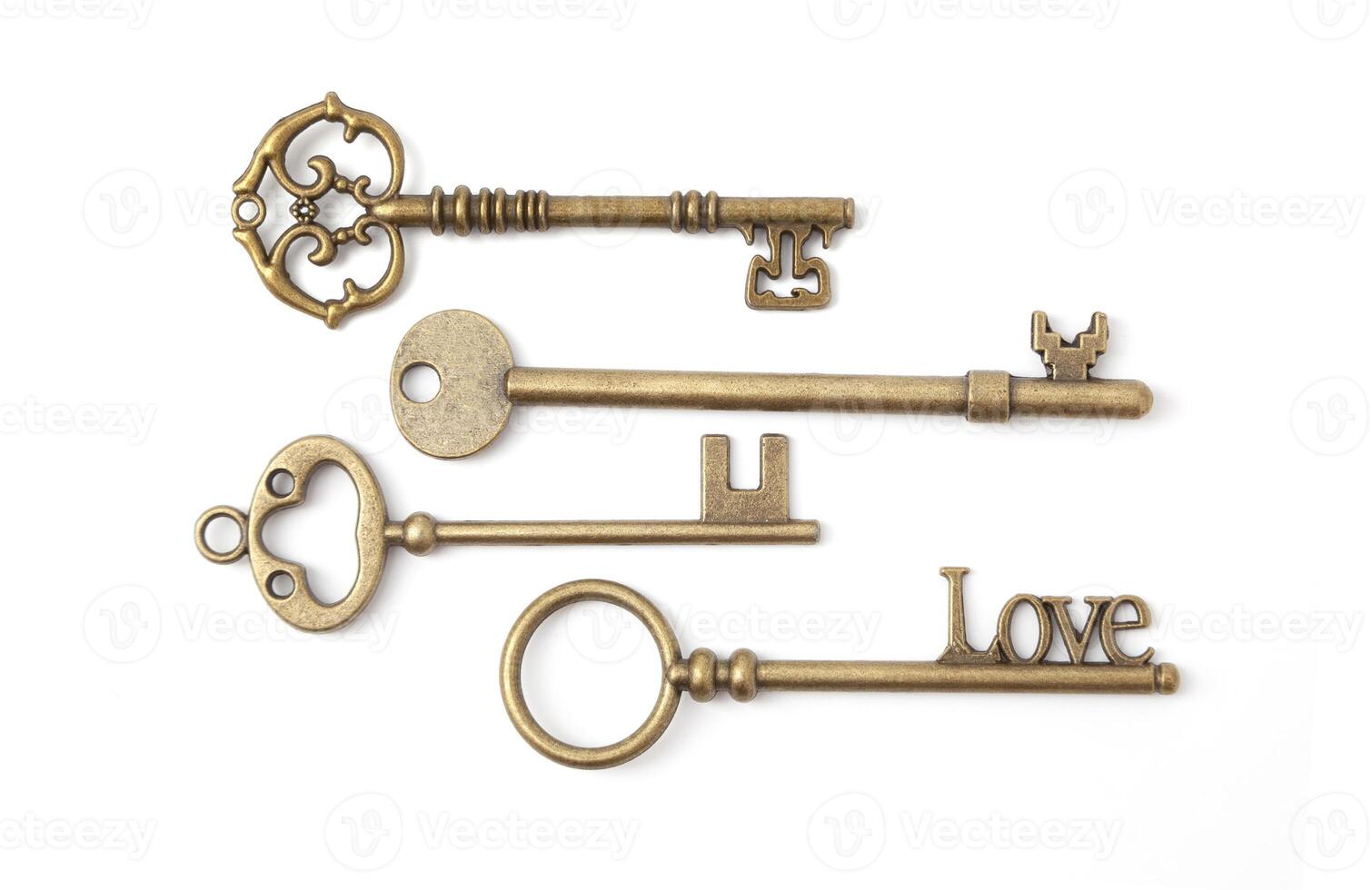 Vintage Keys Collection Isolated On White Background photo