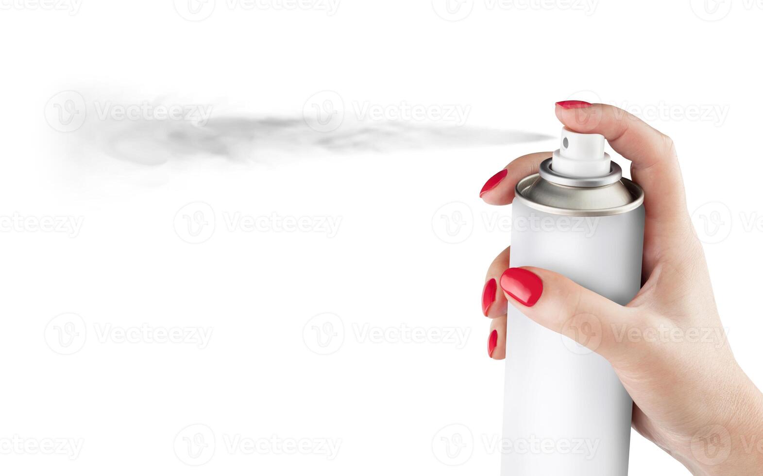 Woman spraying paint from can on white background photo