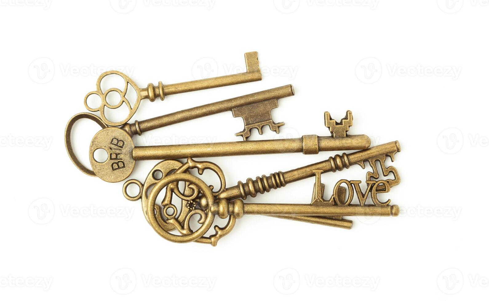 Vintage Keys Collection Isolated On White Background photo