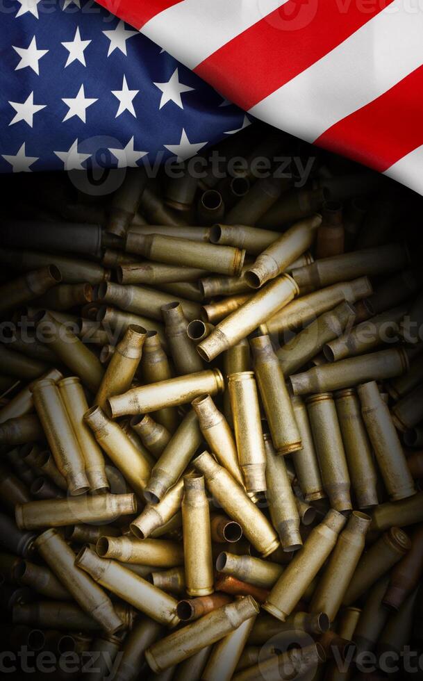 American flag isolated on shotgun cartridges background photo