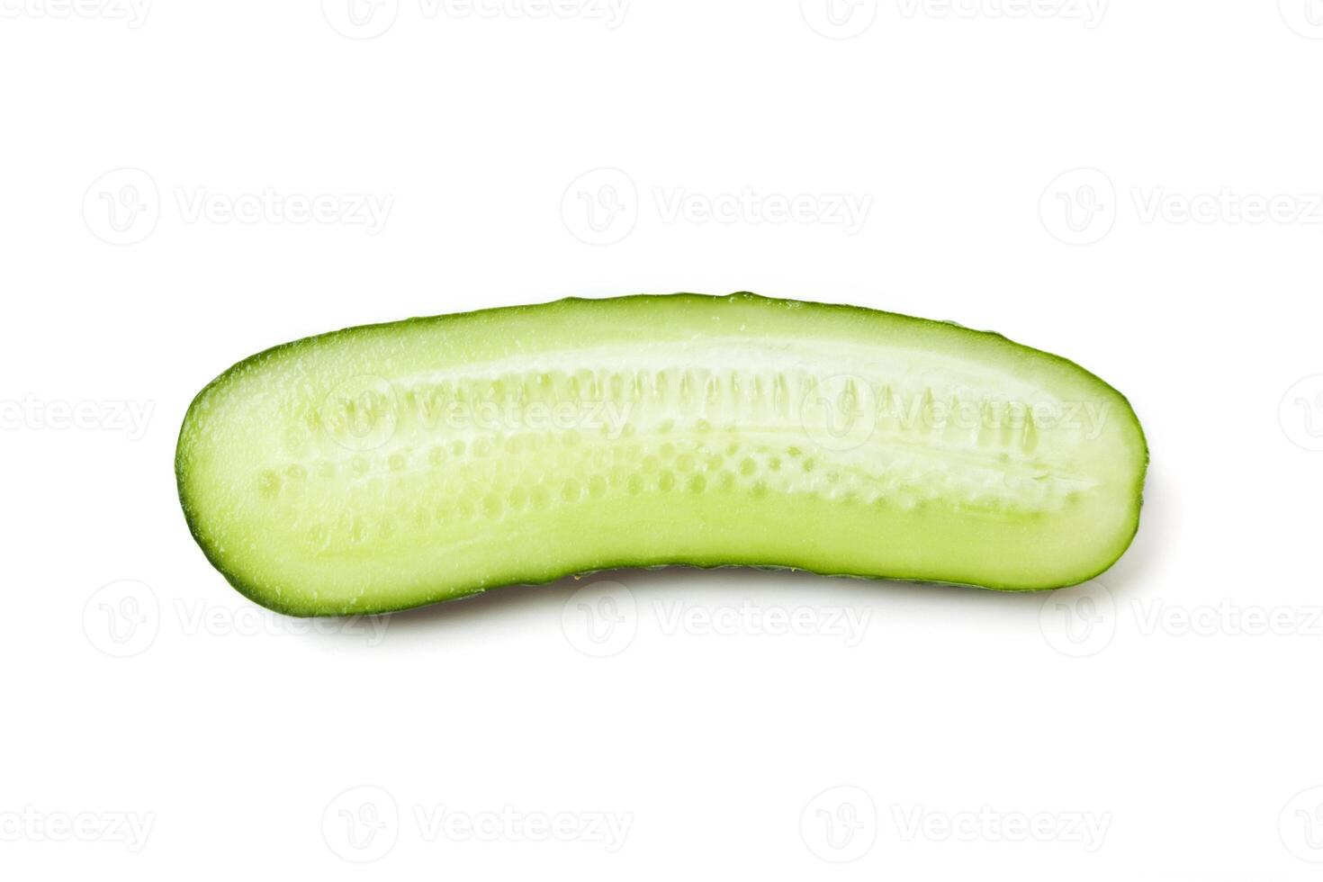 One halve of fresh green cucumber isolated on a white background photo