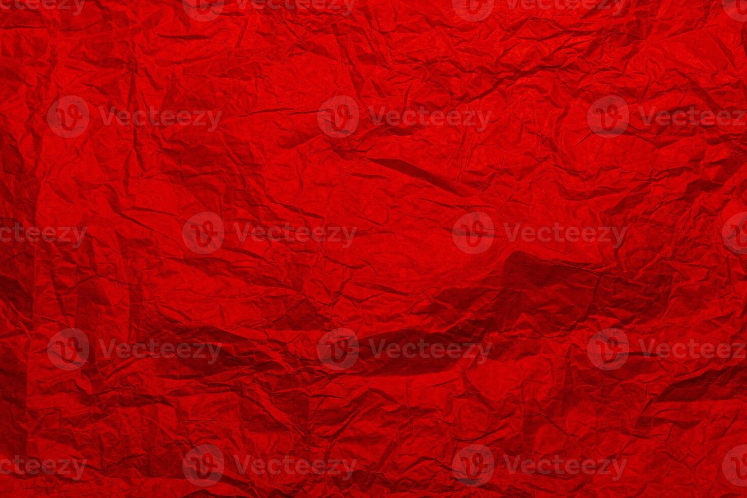 Crumpled craft red color paper texture photo