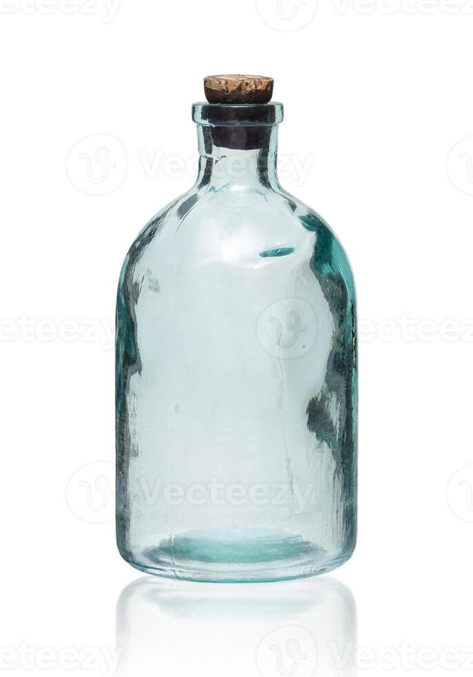 Vintage small glass bottle with paper cork isolated on white photo