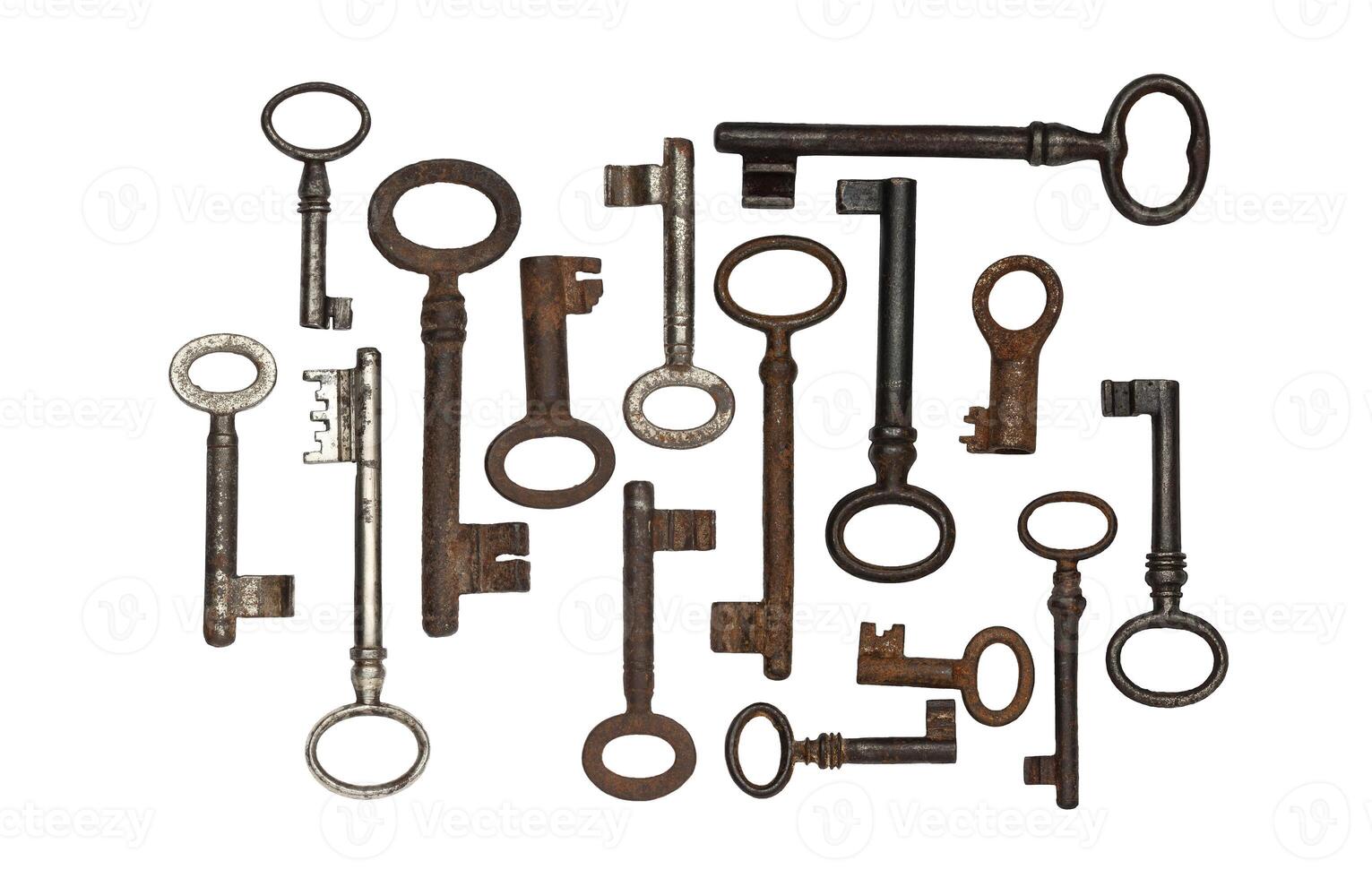old keys isolated on a white background photo