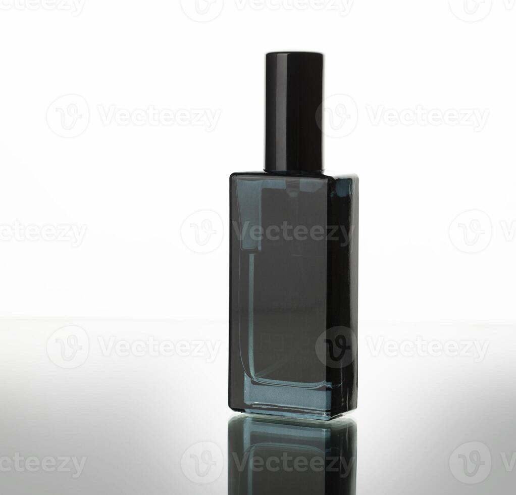 black parfum bottle isolated on white photo