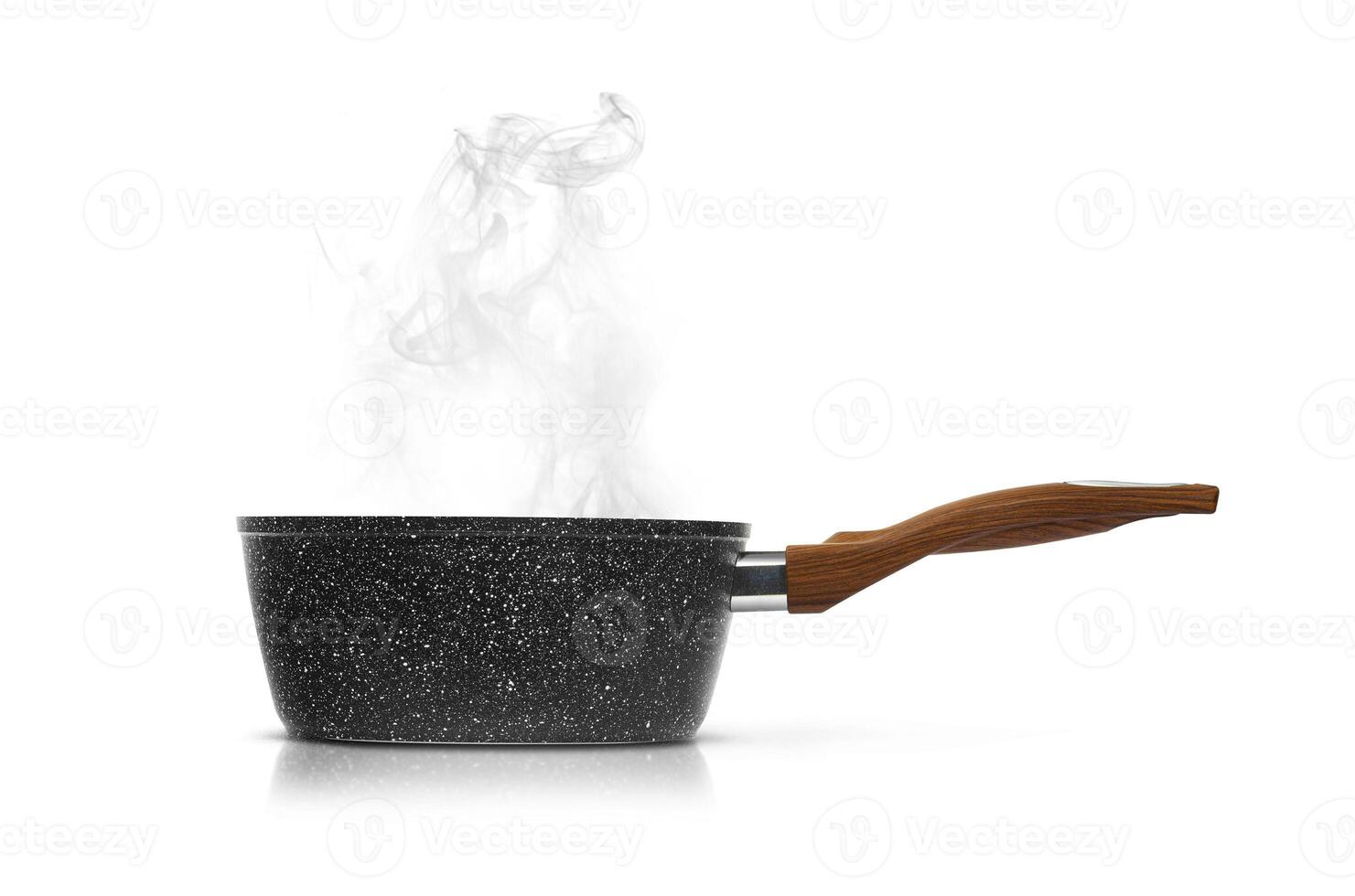 Modern frying pan with non-stick granite coating isolated on white photo