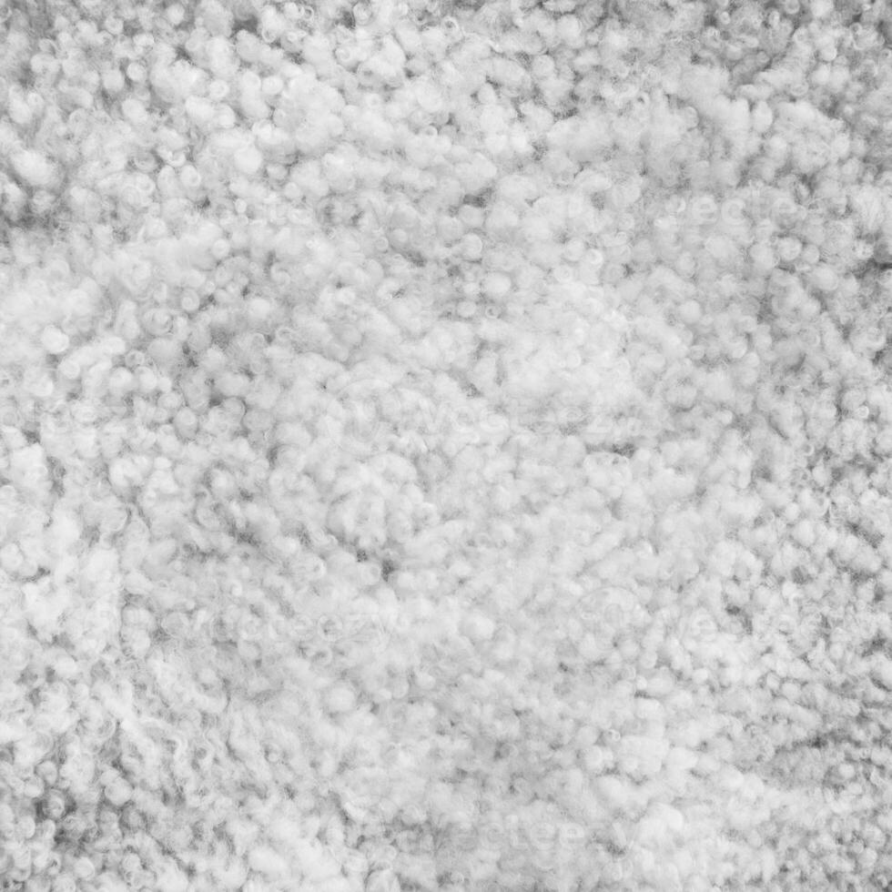 Background picture of a soft fur white carpet photo