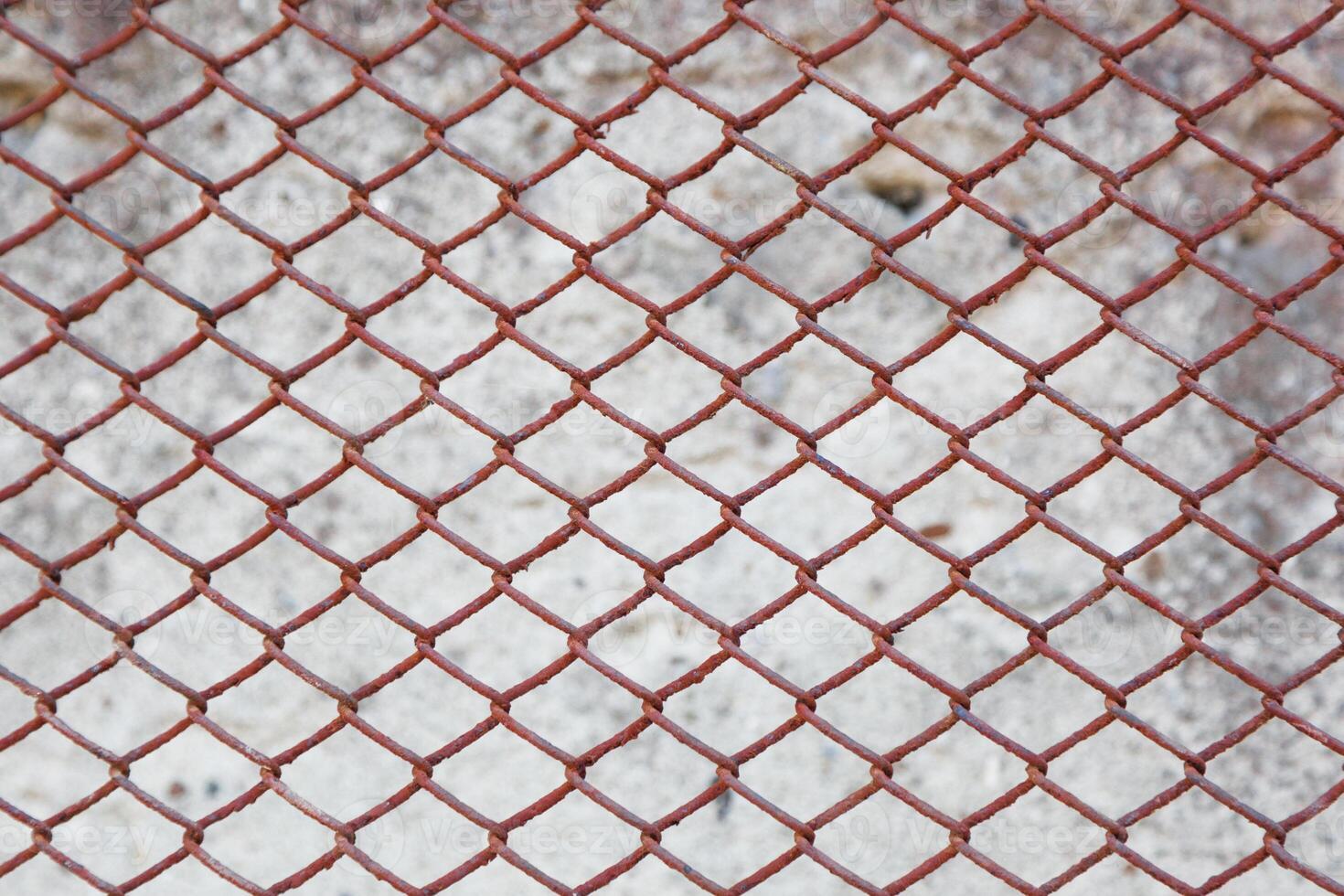 Rusty fence of metal mesh background photo