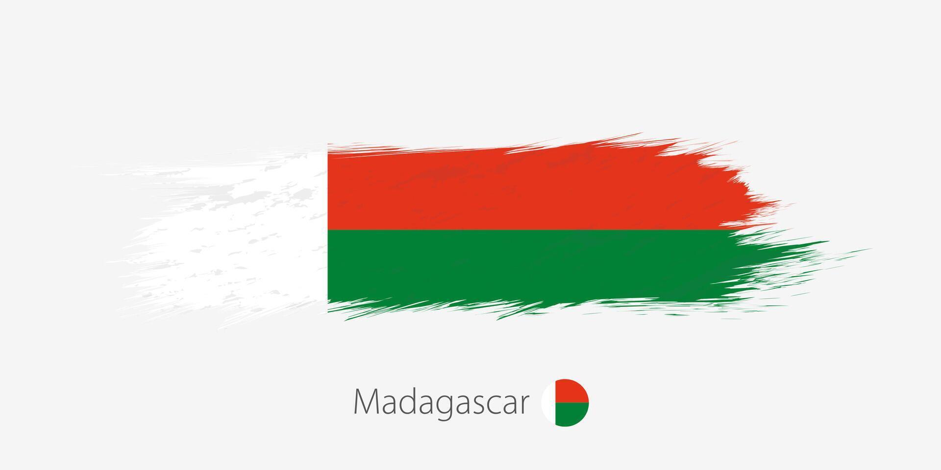 Flag of Madagascar, grunge abstract brush stroke on gray background. vector