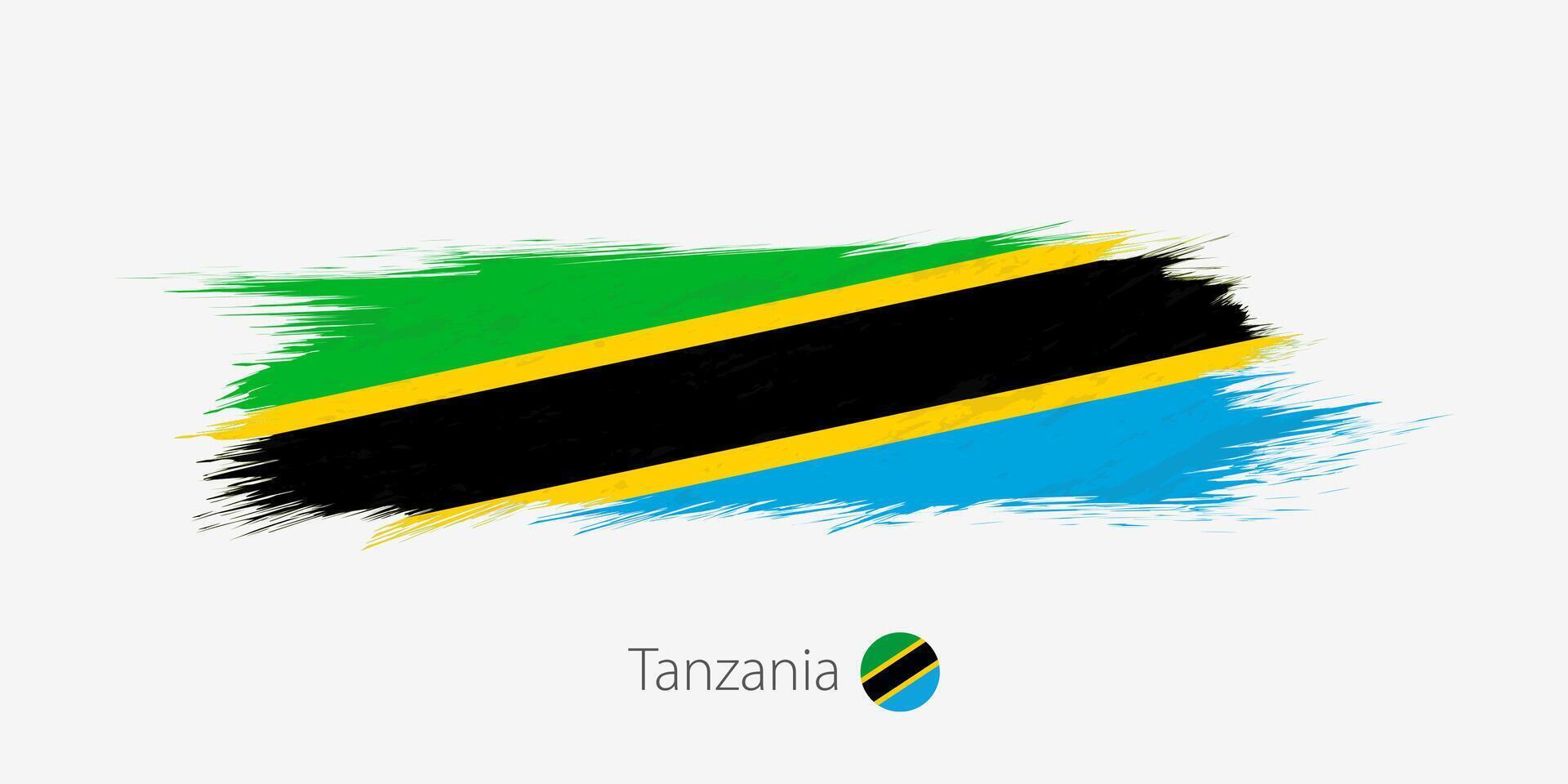 Flag of Tanzania, grunge abstract brush stroke on gray background. vector