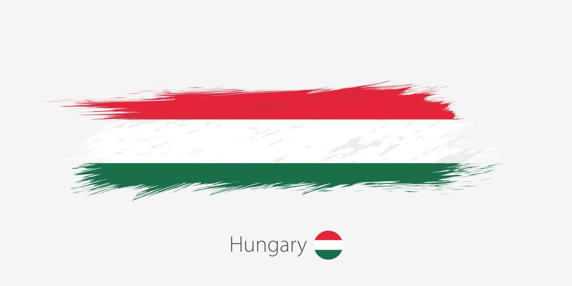Flag of Hungary, grunge abstract brush stroke on gray background. vector