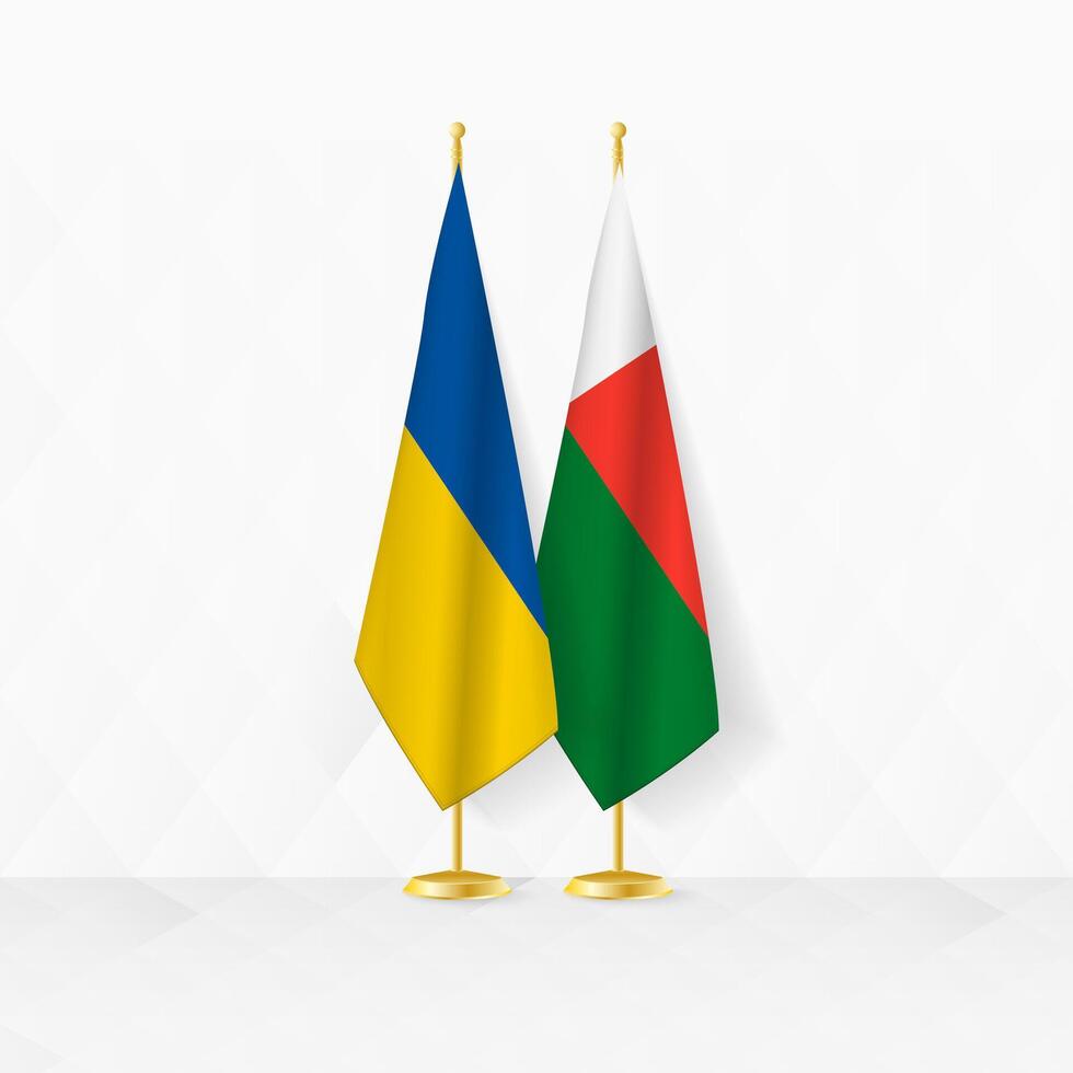 Ukraine and Madagascar flags on flag stand, illustration for diplomacy and other meeting between Ukraine and Madagascar. vector