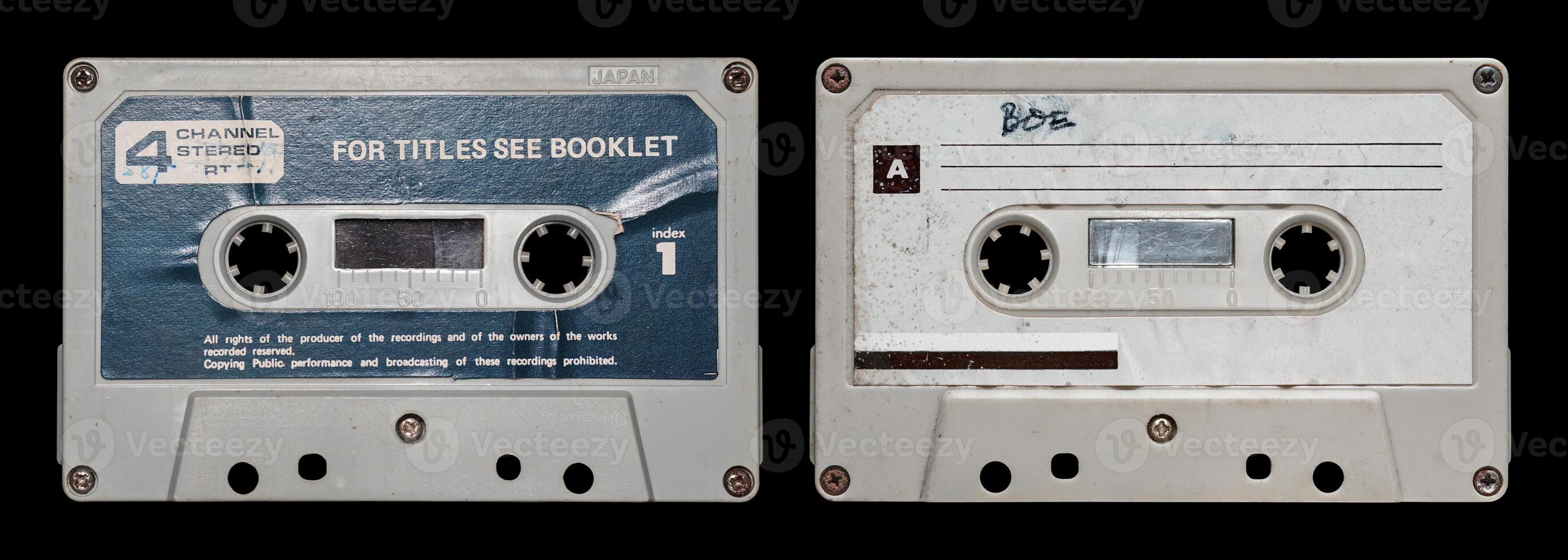 Old white cassette tape collection isolated on black. cassette tape mockup template photo