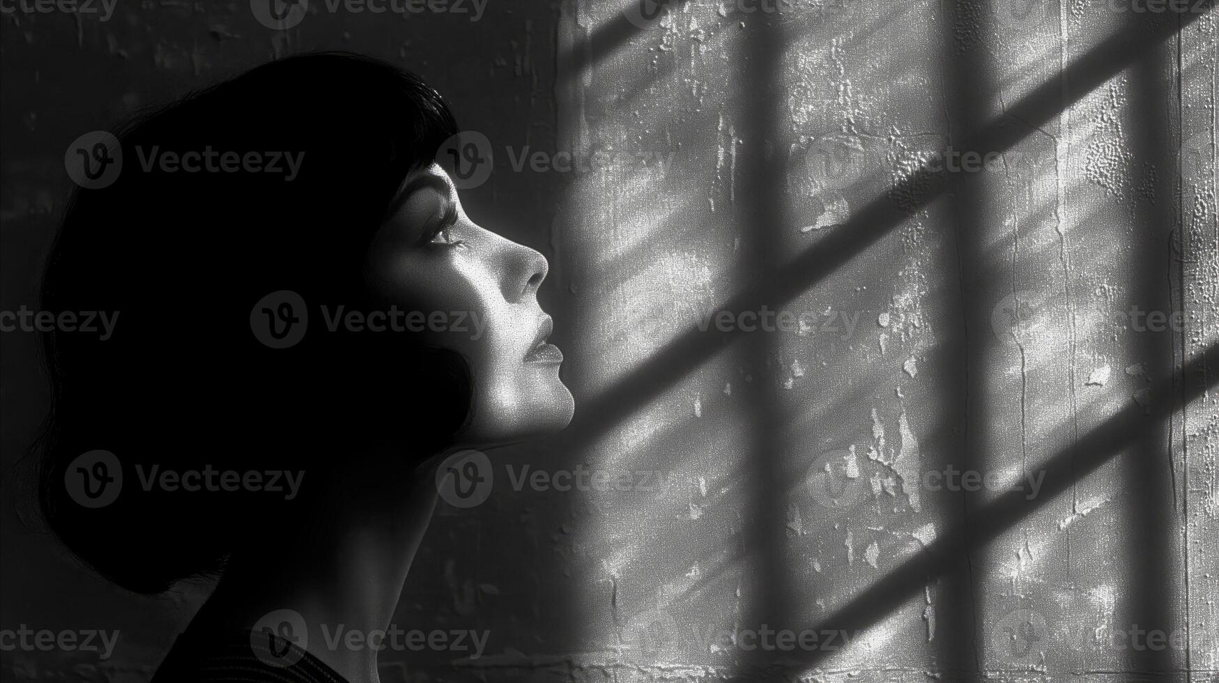 AI generated Contemplative woman by window with light and shadows in monochrome photo