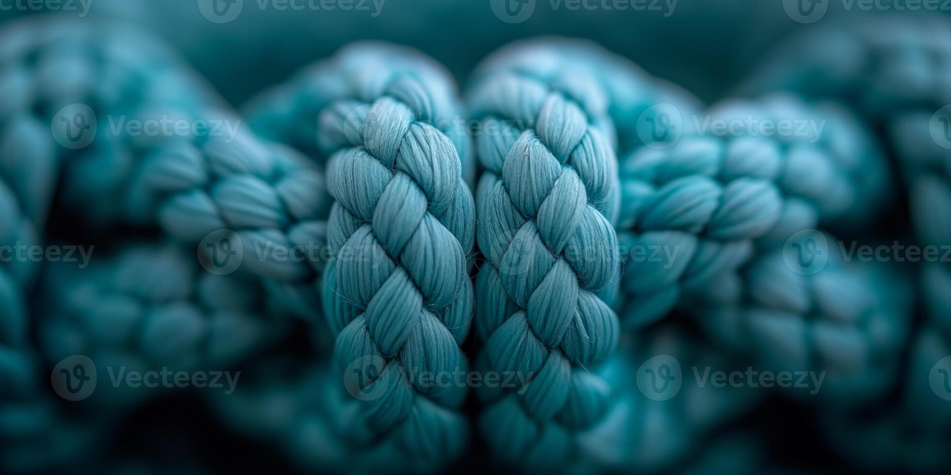 AI generated Close-up of teal braided ropes with detailed texture and patterns photo