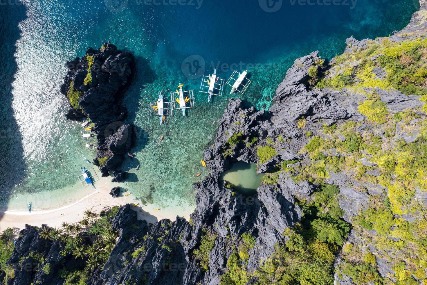 Aerial view of different bangka boat, in Secret Lagoon. photo