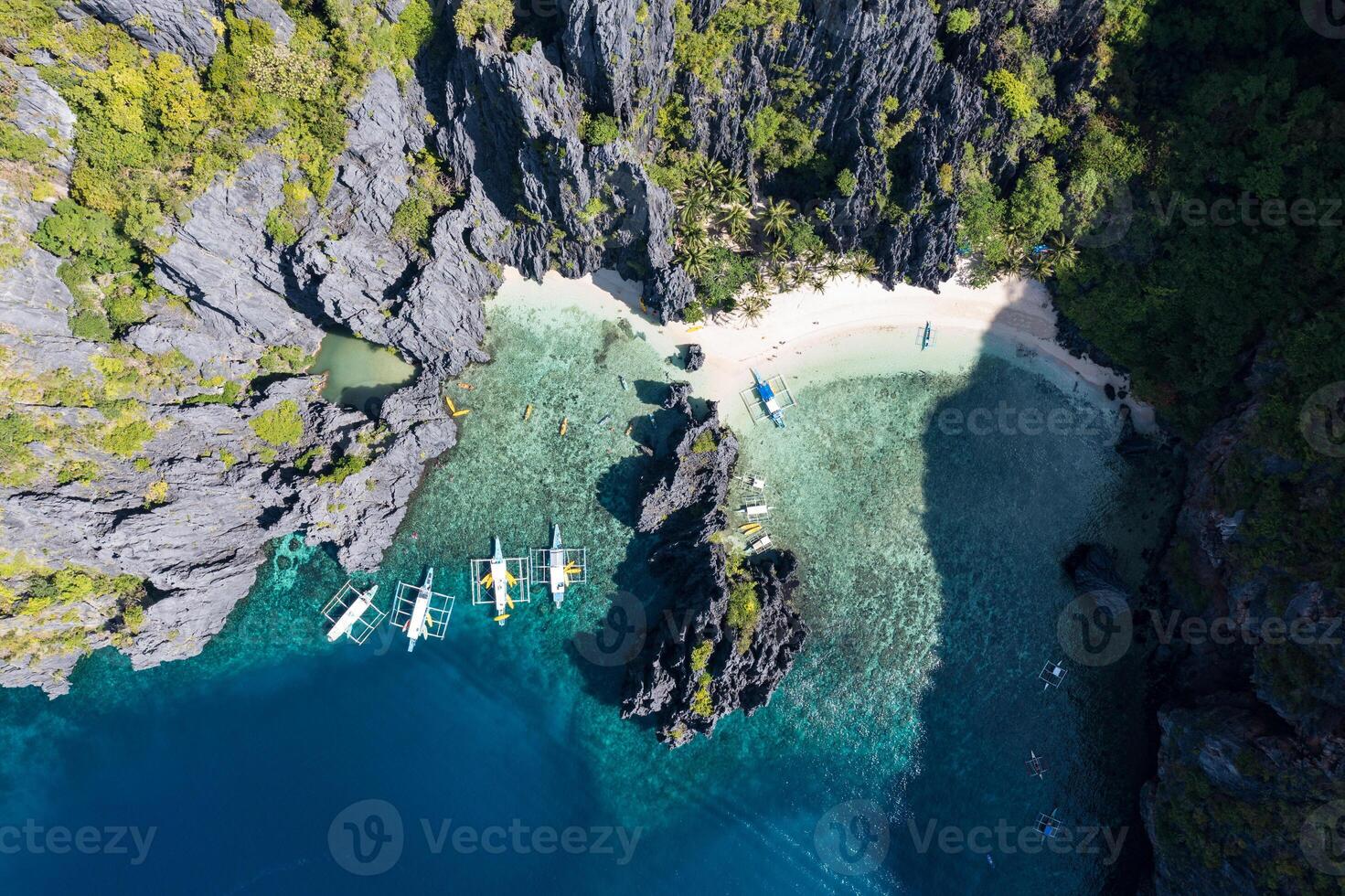 Aerial view of different bangka boat, in Secret Lagoon. photo