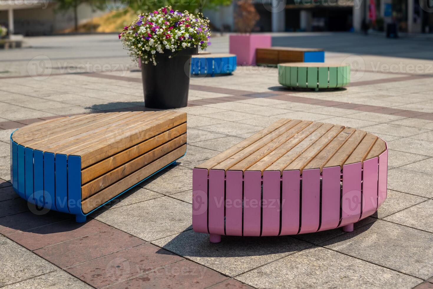 colourful seating options in a city photo