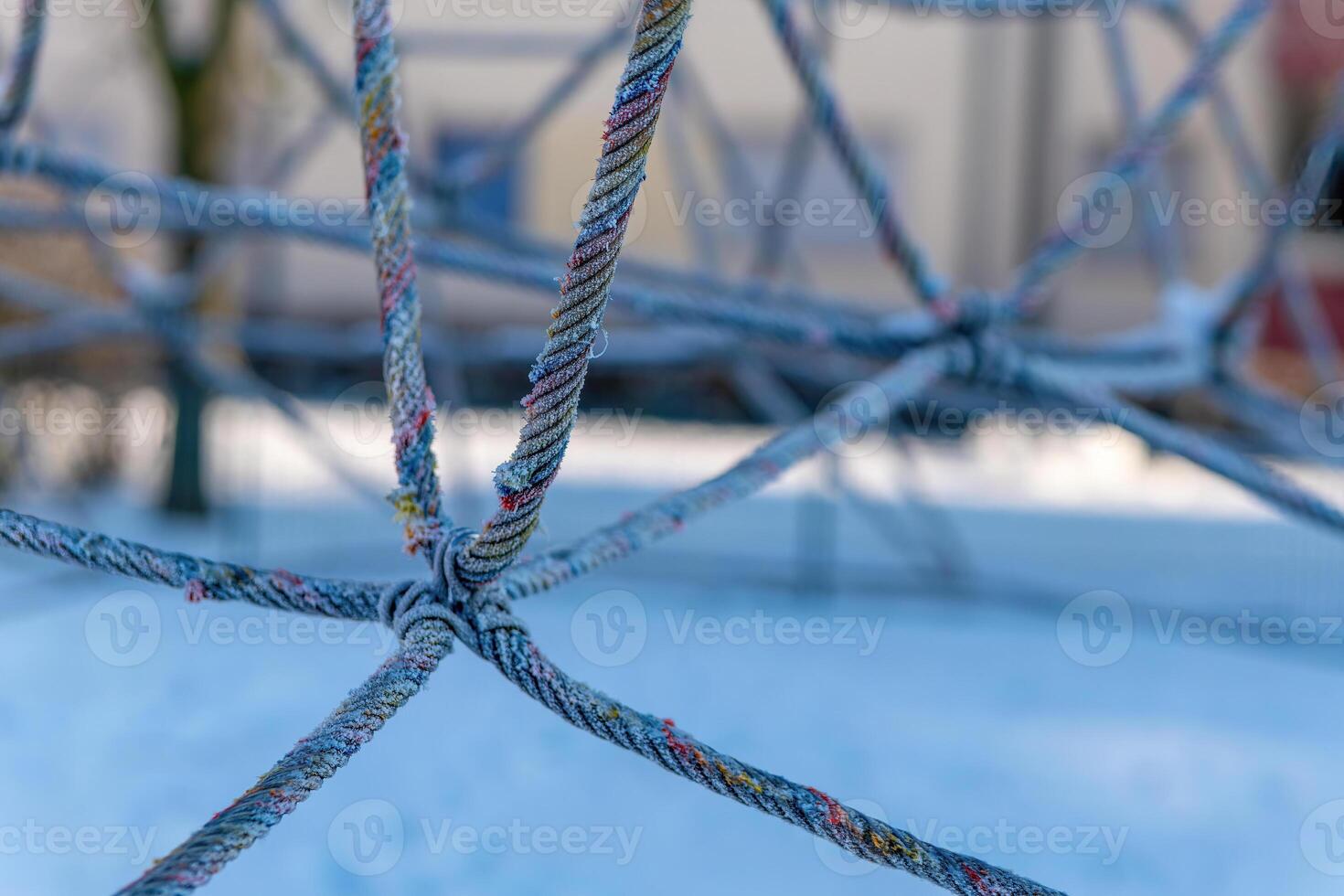 climbing frame made of ropes in winter photo