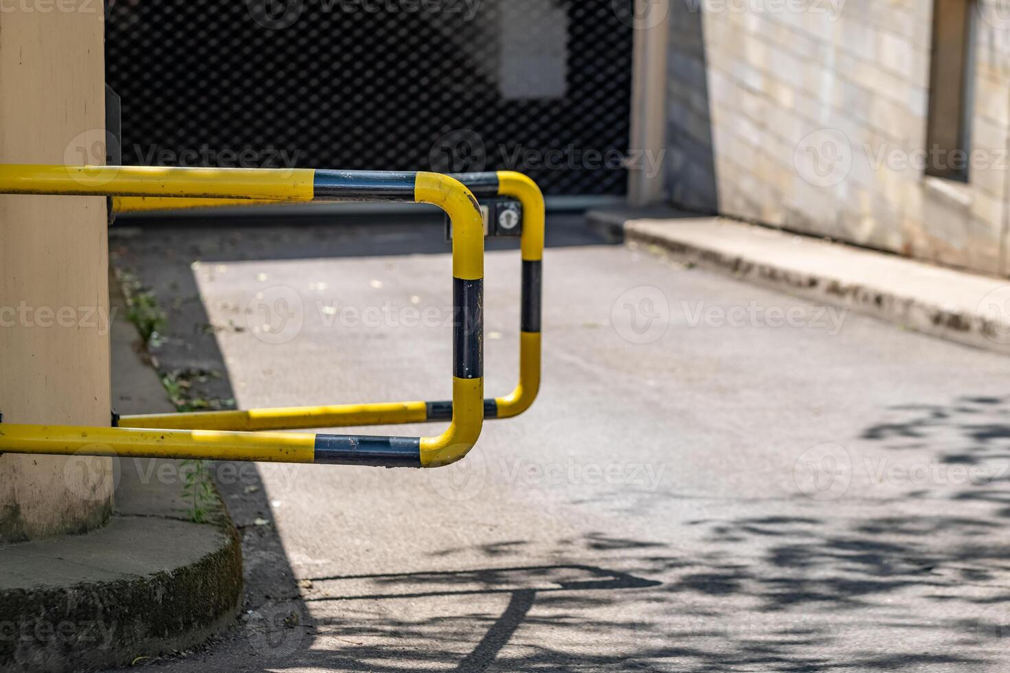 a security barrier in front of a parking garage photo