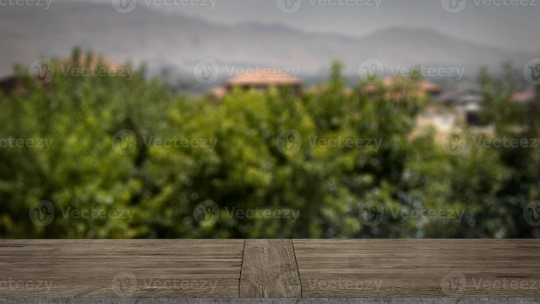 Blank wooden table with blurred background. Good for product arrangement photo