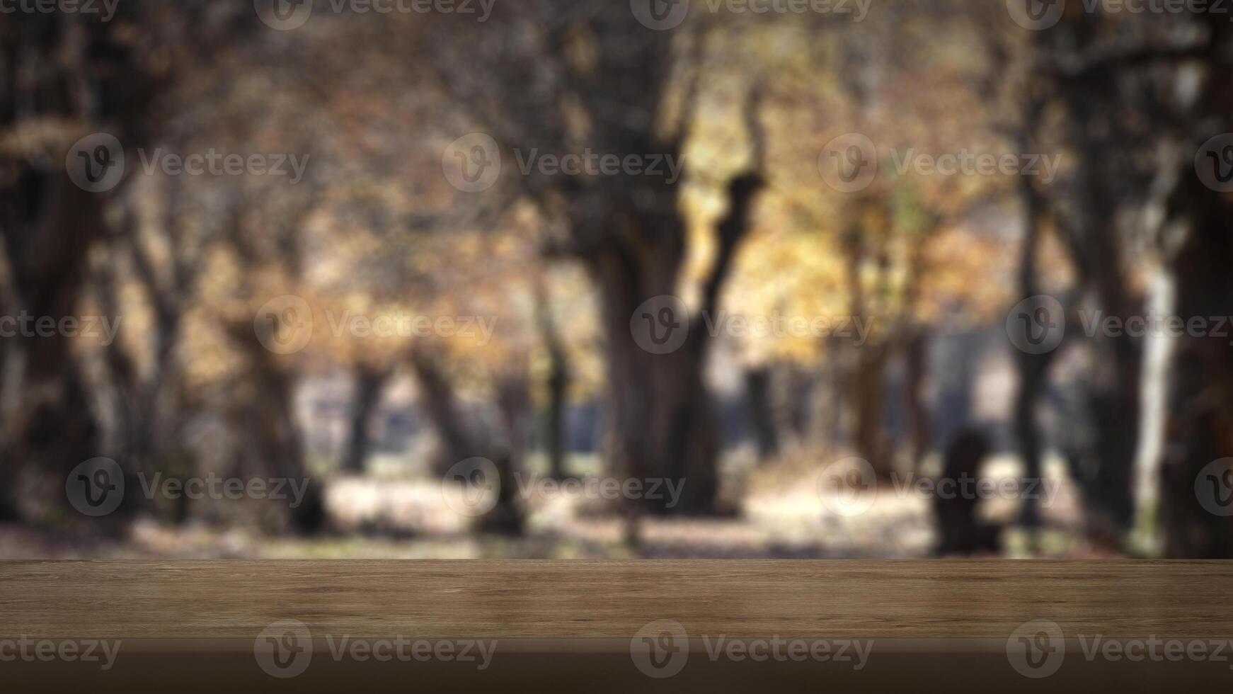 Blank wooden table with blurred background. Good for product arrangement photo