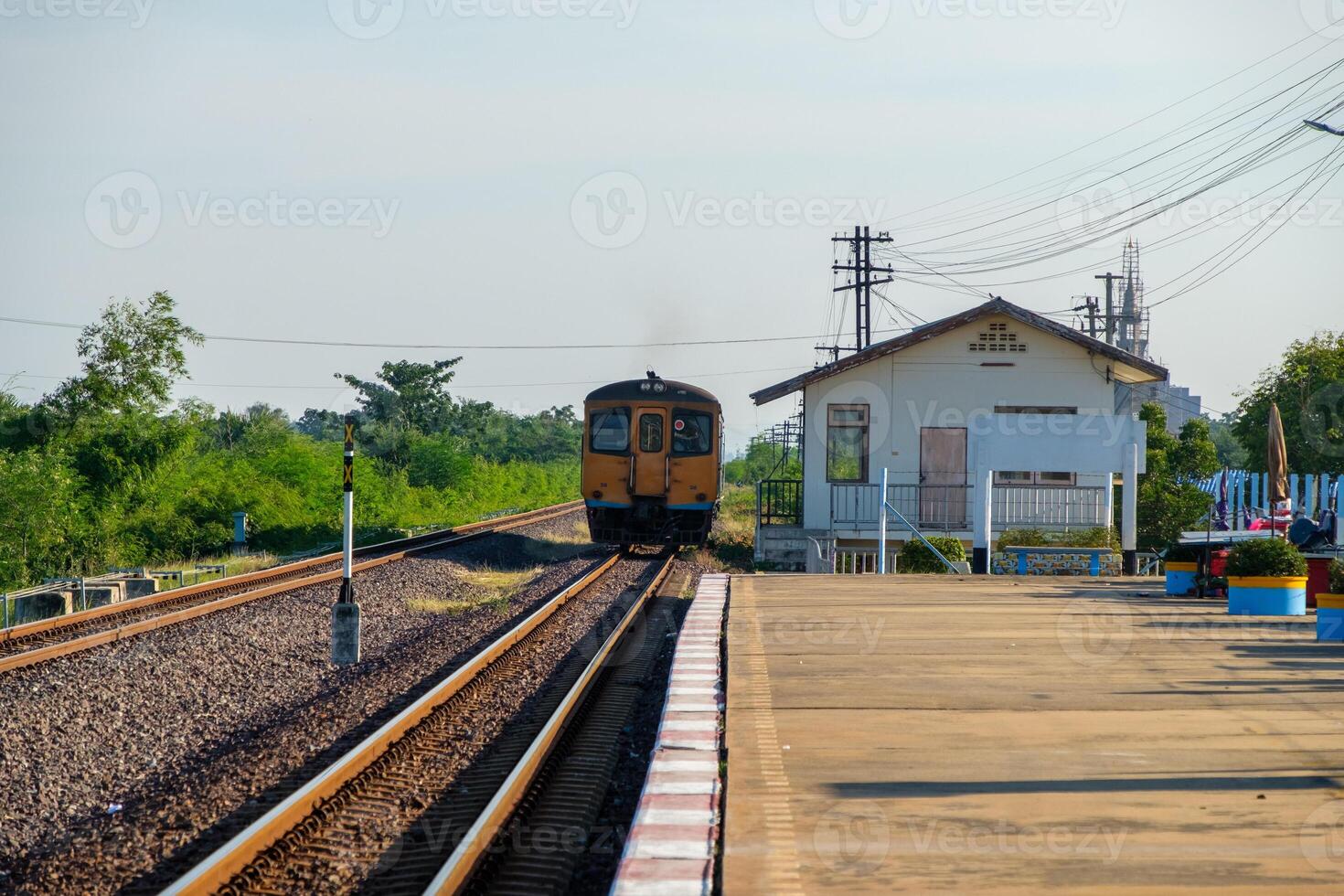 The diesel multiple unit is leaving from the local station. photo