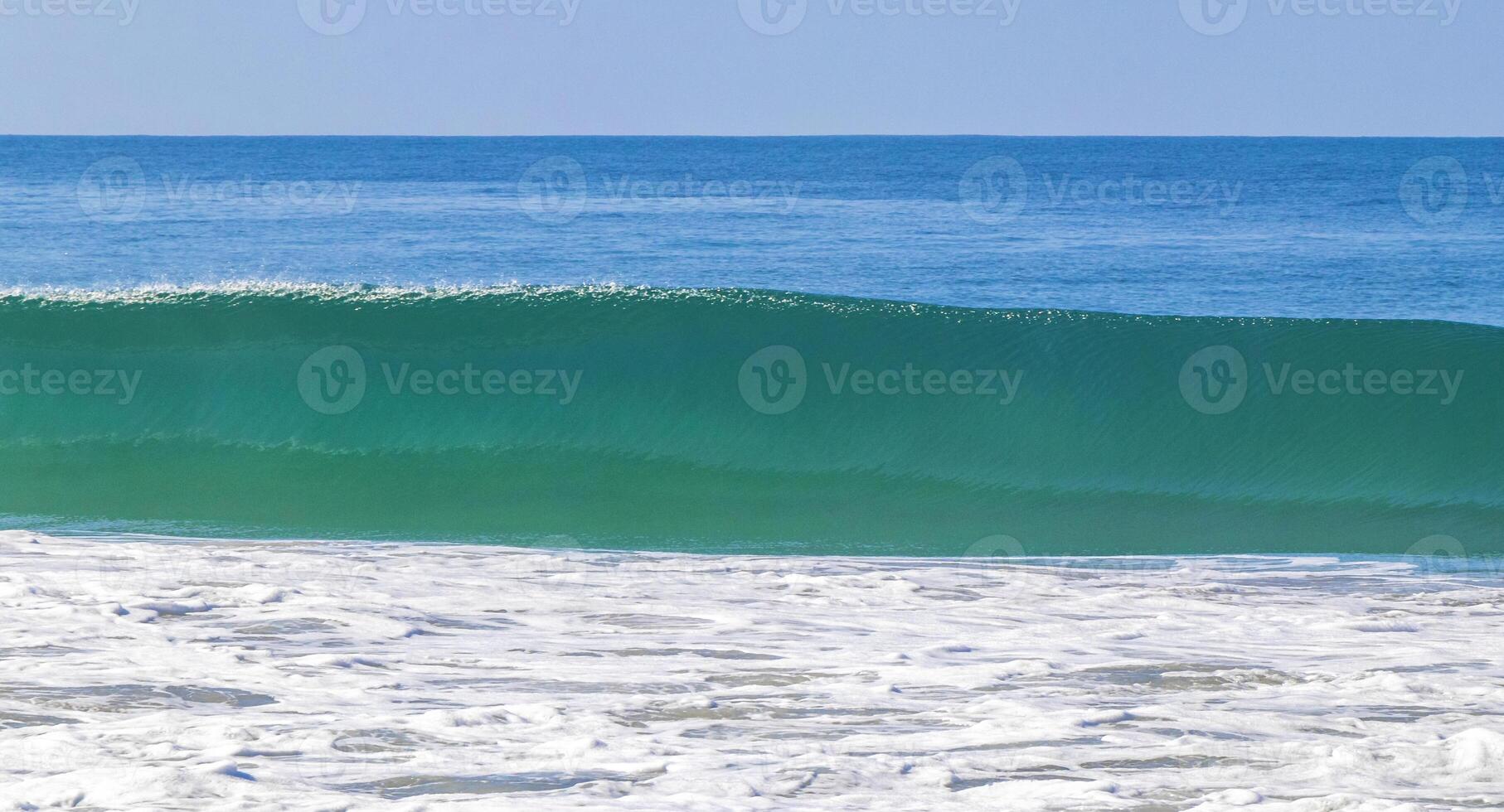 Extremely huge big surfer waves at beach Puerto Escondido Mexico. photo