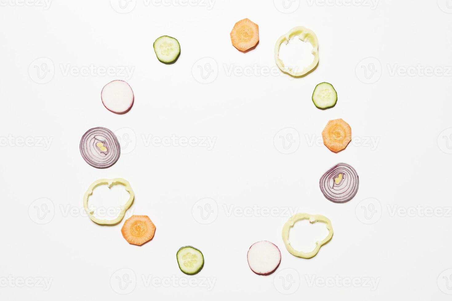 a white background with sliced vegetables photo