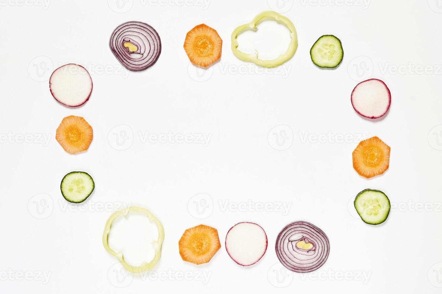a white background with sliced vegetables photo