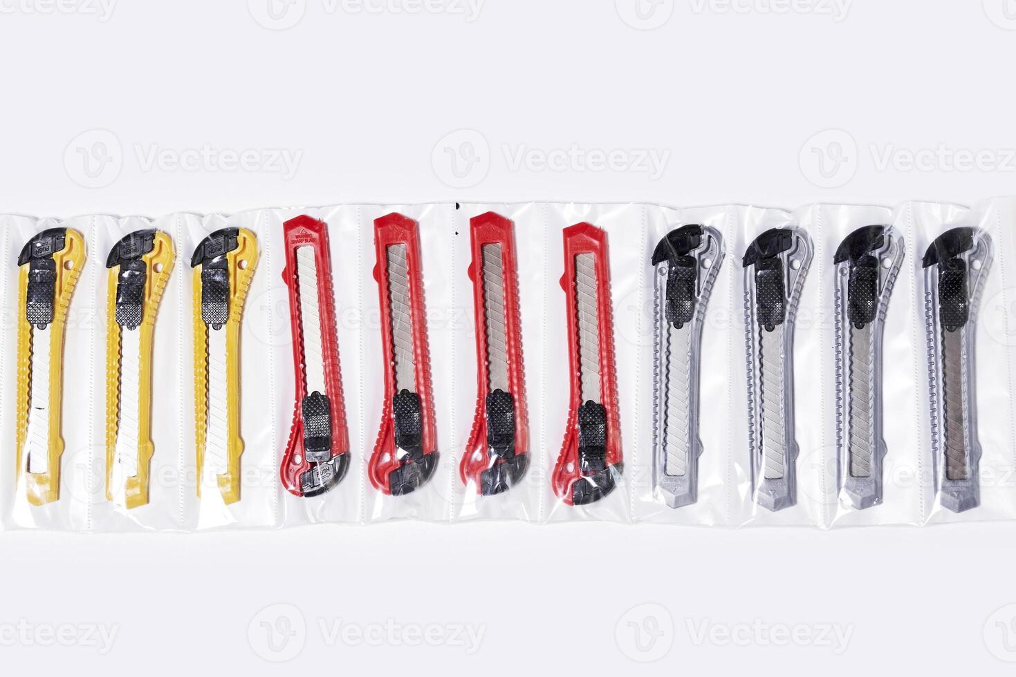 Packs of cutters in a clear bag photo