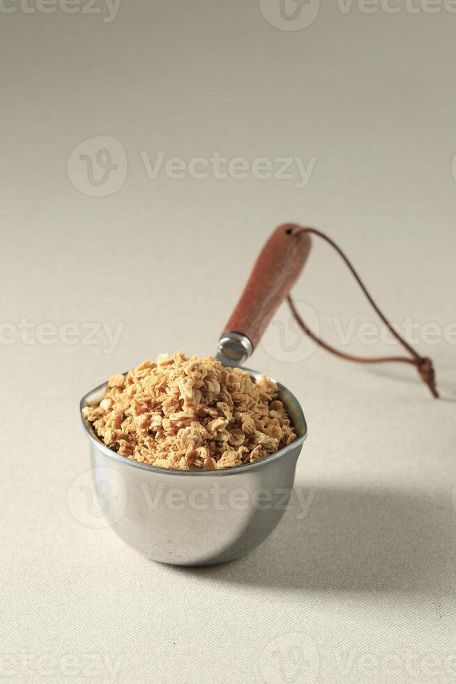 Granola Breakfast on Stainless Measuring Cup photo
