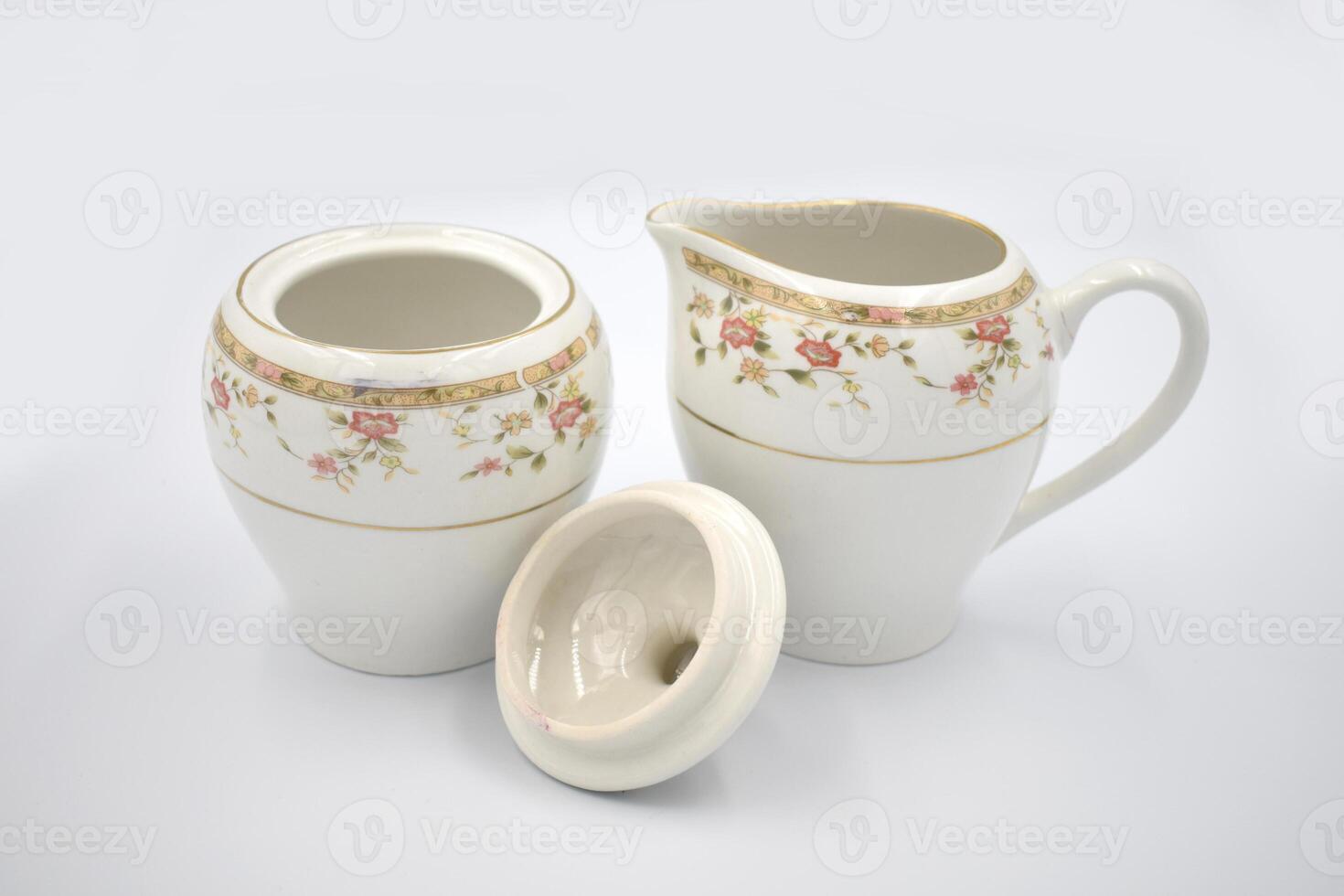 Elegant white ceramic tea coffee canisters, tea pot, coffee pot photo